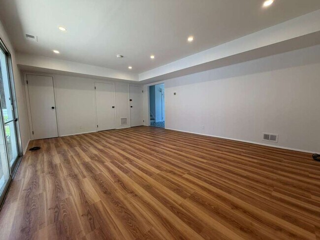 Building Photo - Spacious 4-Bedroom Home with Functional Layout, Backyard Access & Attached Garage