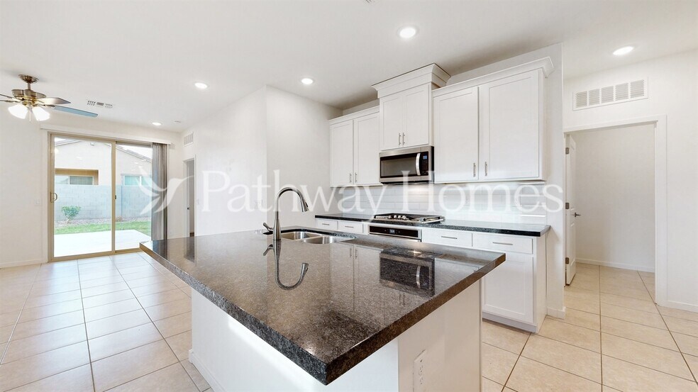 Building Photo - 40369 W Hillman Dr