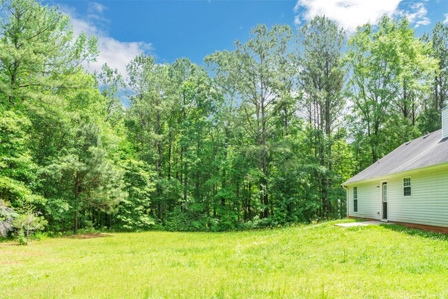 Building Photo - Charming Ranch-Style Home with Spacious Ya...