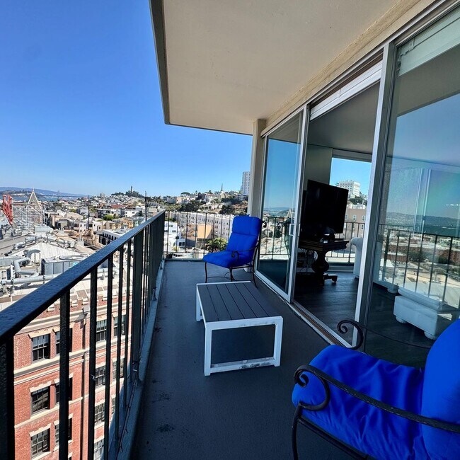 Building Photo - Just Unpack, Pour a Beverage, & Cue the Su...