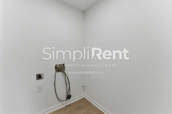 Building Photo - Updated Home with Spacious Layout & Private Backyard