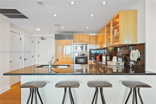 Building Photo - 6799 Collins Ave