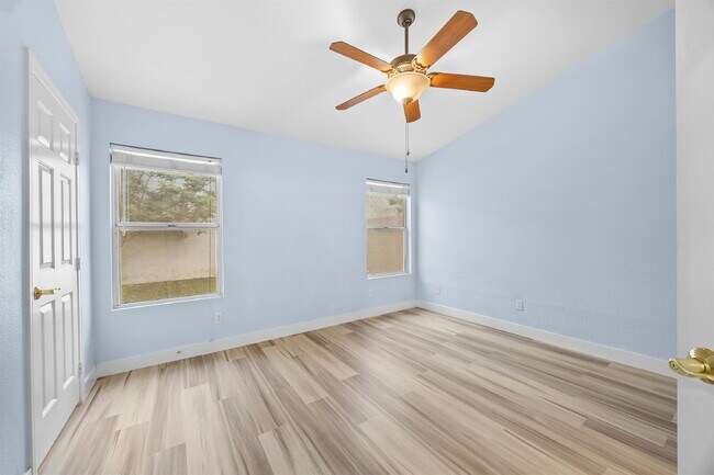 Building Photo - Charming and spacious single-story townhome nestled within a gated community in the desirable Nor...