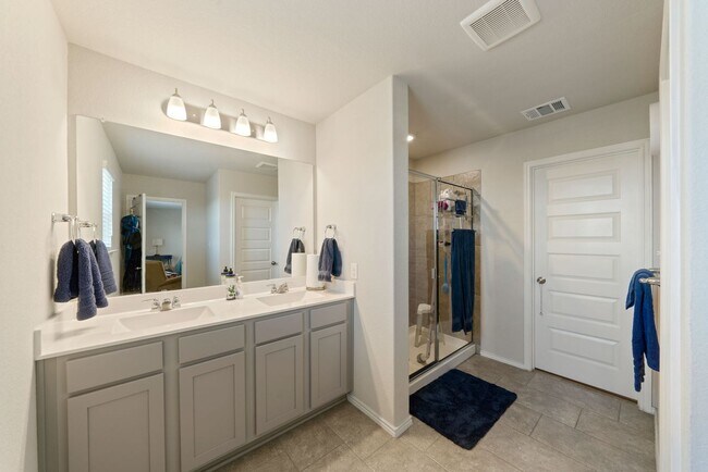 Building Photo - Stylish 4-Bedroom Home with Solar & Game R...