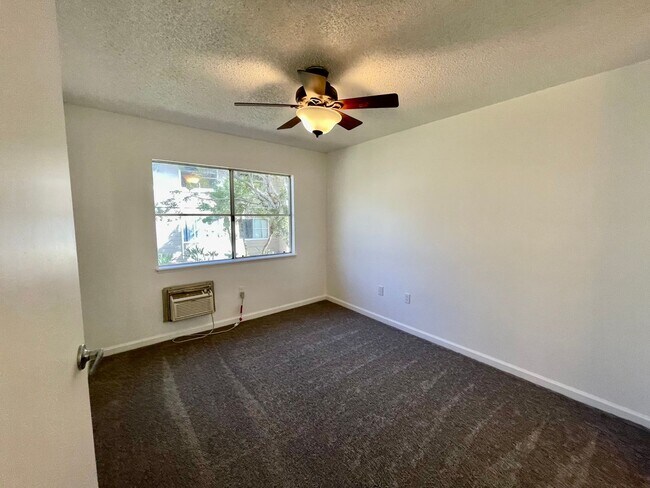 Building Photo - Discover a refreshed 2-bedroom, 2-bathroom residence in Mililani Mauka, complete with 2 parking s...