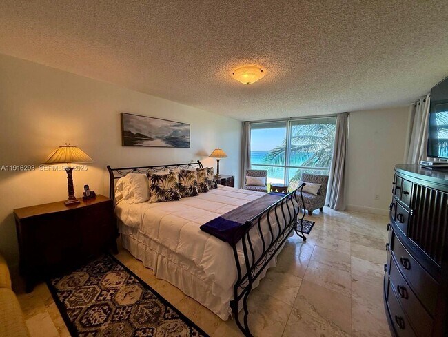 Building Photo - 16711 Collins Ave