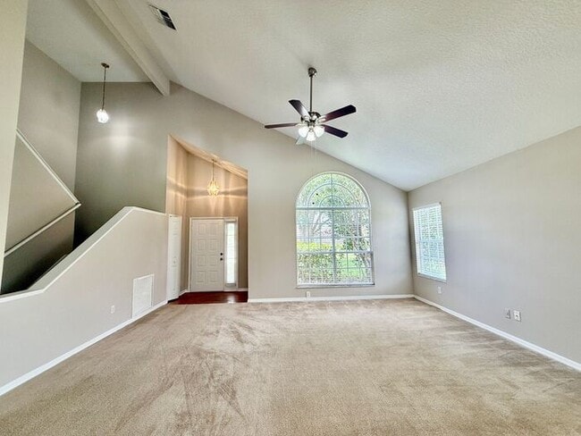 Building Photo - LARGE AND SPACIOUS 4/3 HOME IN EAST ORLANDO WEDGEFIED COMMUNITY