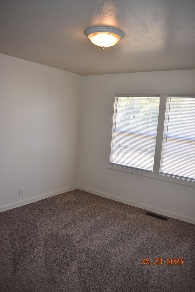 Building Photo - Charming Three Bedroom Home with New Carpe...