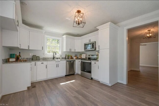 Building Photo - 4865 Hampshire Ave