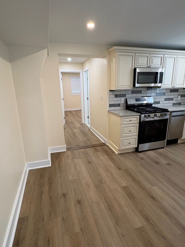 Building Photo - Beautifully Rebuilt Three Bedroom Duplex Near Four Mile Run and I-395