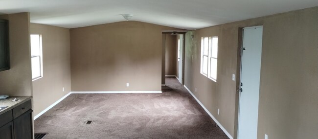 Primary Photo - 135 SE Guinevere Ct