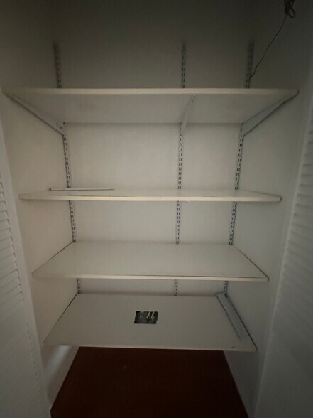 Hallway/Linen Closet - 131 Country Club Dr