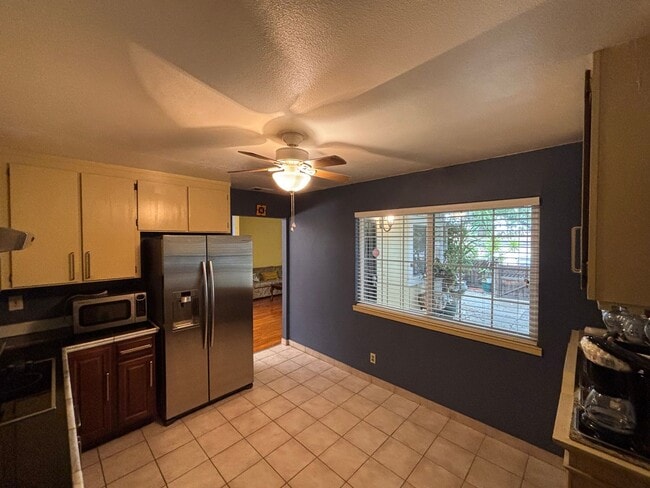 Building Photo - Beautiful Single-Story Townhome on Corner Lot with Private Courtyard & 2-Car Garage