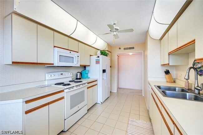 Building Photo - 6000 Pelican Bay Blvd