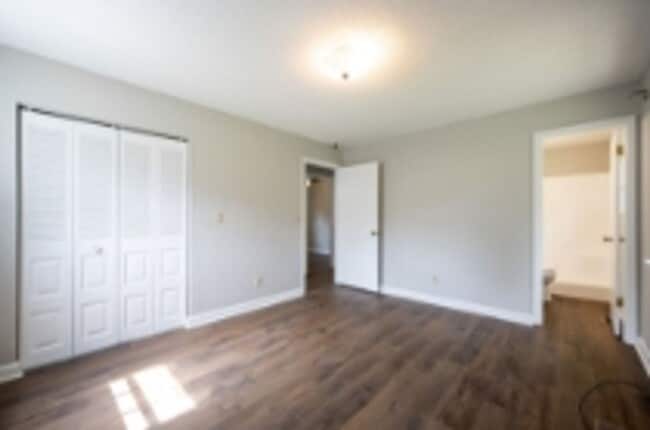 Building Photo - This beautifully updated brick home in Har...