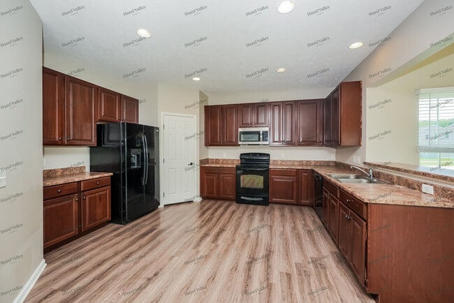 Building Photo - 8726 Harvest Ridge Way
