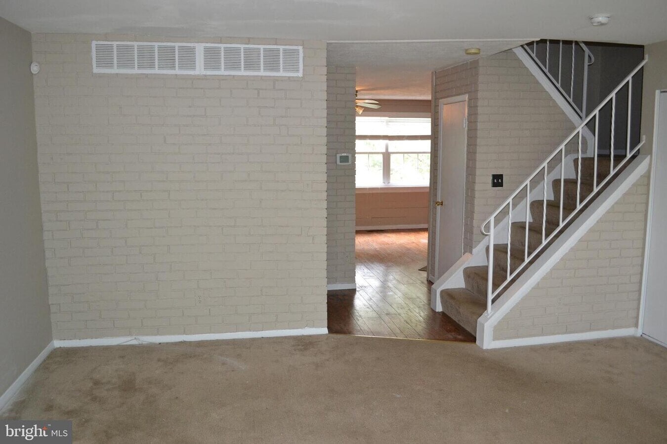 kitchen/Dinning area along with stairs to the top floor - 302 Hometown Way