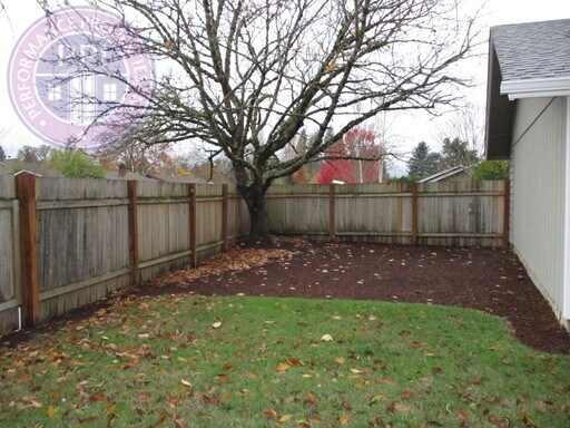 Building Photo - Updated Ranch, Large Fenced Backyard, 1 Pe...