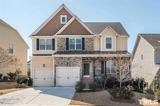 Building Photo - Beautiful 4-Bedroom Stone Front Home in Prime West Cary Location with Fenced Backyard & Resort-St...