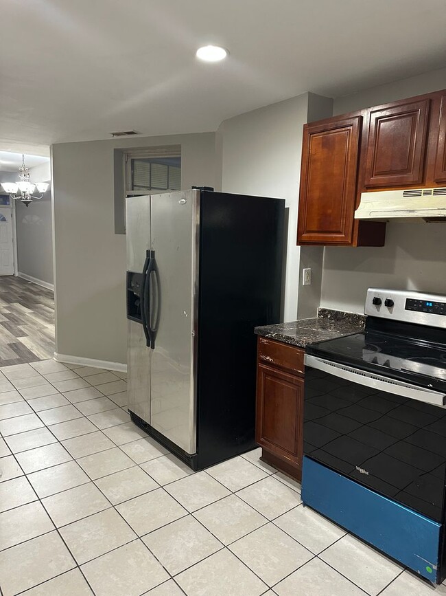 Building Photo - Spacious, Newly Renovated Home! Central Air! Finished Basement! W/D! Double Level Rear Deck! Avai...