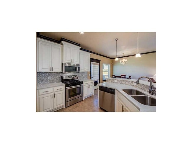 Building Photo - Contemporary Home + Wood Floors + Storm Shelter + Edmond Schools