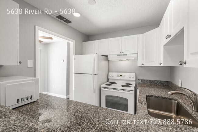 Building Photo - 5638 River Rd