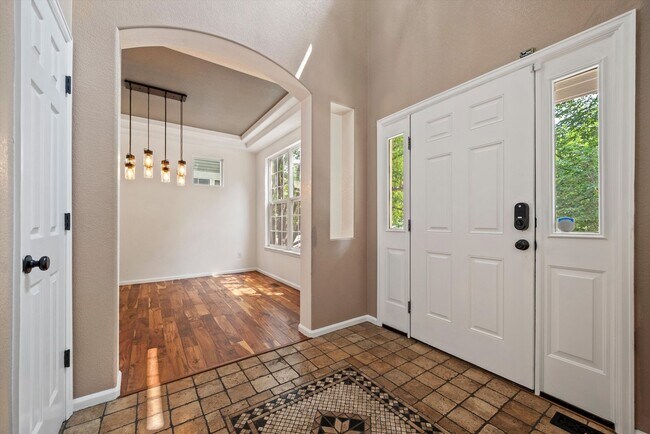 Building Photo - Stunning Tennyson Park Home | 4 Bedrooms, Finished Basement & Open Space Views