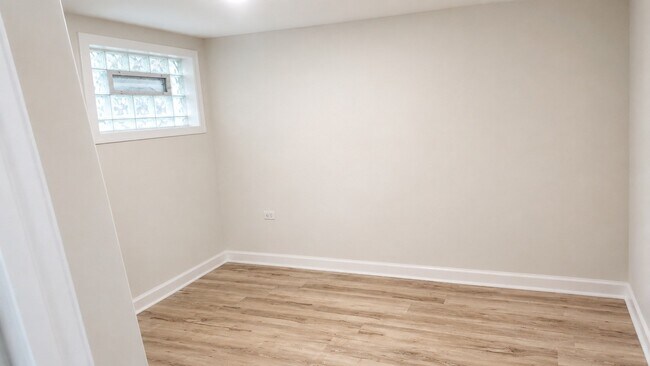 Building Photo - 7514 S Langley Ave