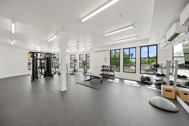 Building Photo - Modern 2BD Fremont Condo – EV Charger, Balcony, & Walk to BART