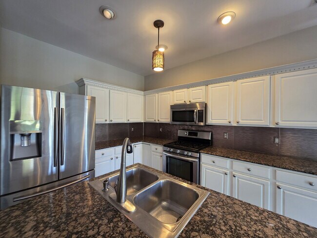 Building Photo - Lakefront 3BR/3BA with Water Views, Garage & Covered Deck