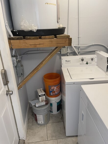 Laundry room adjacent to back door of apartment - 3815 1ST AVE N