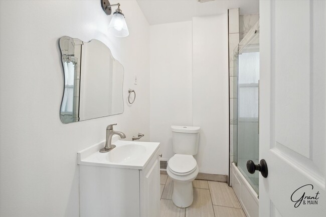 Building Photo - $1650 - Large 4 Bedroom, Renovated Home
