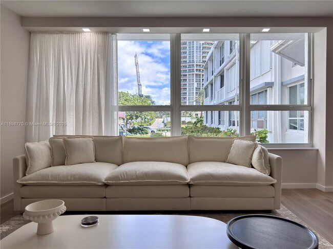 Building Photo - 10230 Collins Ave