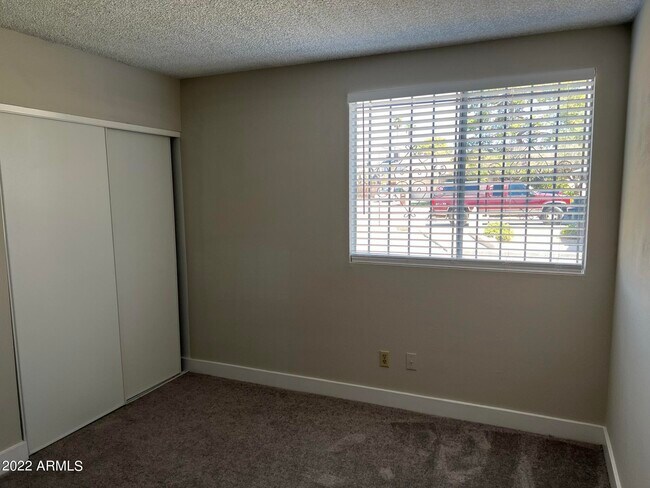 Building Photo - 7827 W College Dr