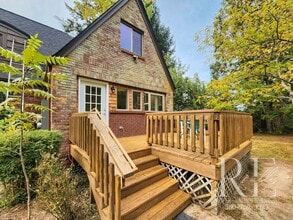 Building Photo - Charming Tudor Loft with Spiral Staircase & Waterfront Access