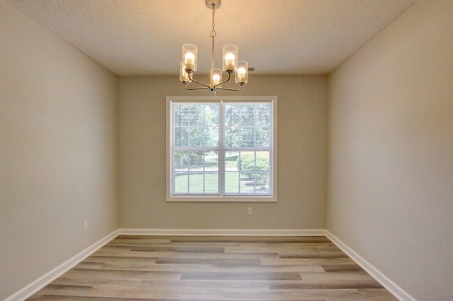 Building Photo - Stunning Brick Front Home With Fireplace And Hardwood Flooring In Sango Area