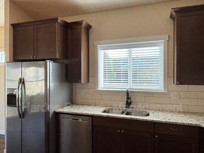 Building Photo - 9070 W Songwood Dr