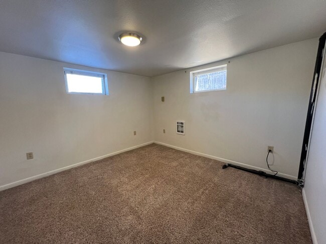 Building Photo - Humble Basement Unit available NOW!