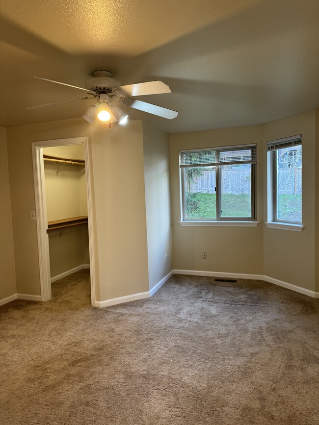 master bedroom with walk-in closet - 8310 Woodlawn Ave SW