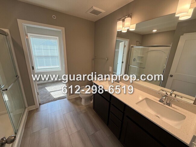 Building Photo - End Unit Townhouse Available Now, Open Floor Plan, Loft Area, Large Primary Suite, Side Patio