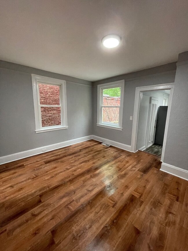 Building Photo - Updated 3 Bedroom House With a backyard and Laundry