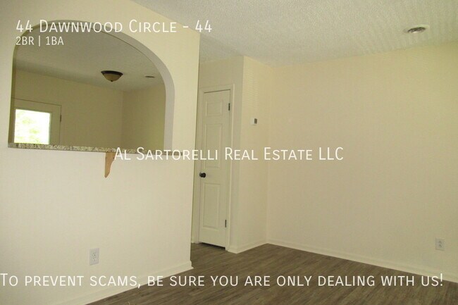 Building Photo - Pet Friendly Condo close to town and ready...
