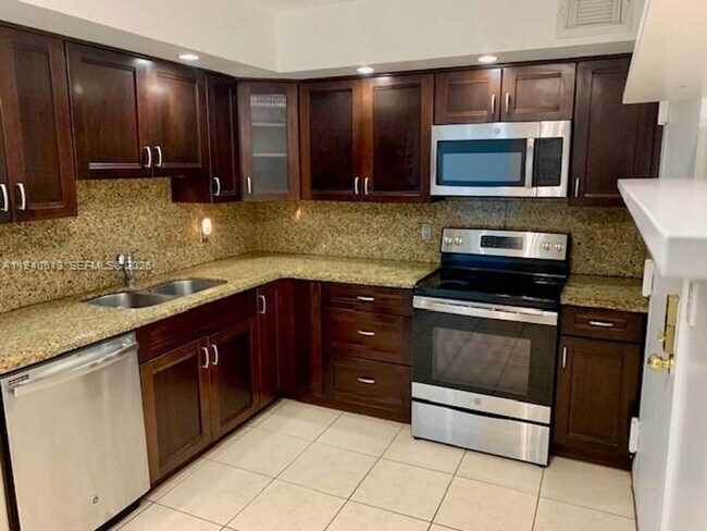 Building Photo - 5750 Collins Ave