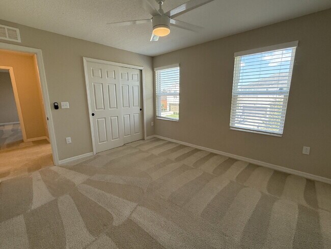 Building Photo - Spacious 4-Bedroom Retreat with additional office/den in the Heart of Trinity!