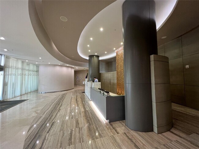 Building Photo - 10275 Collins Ave