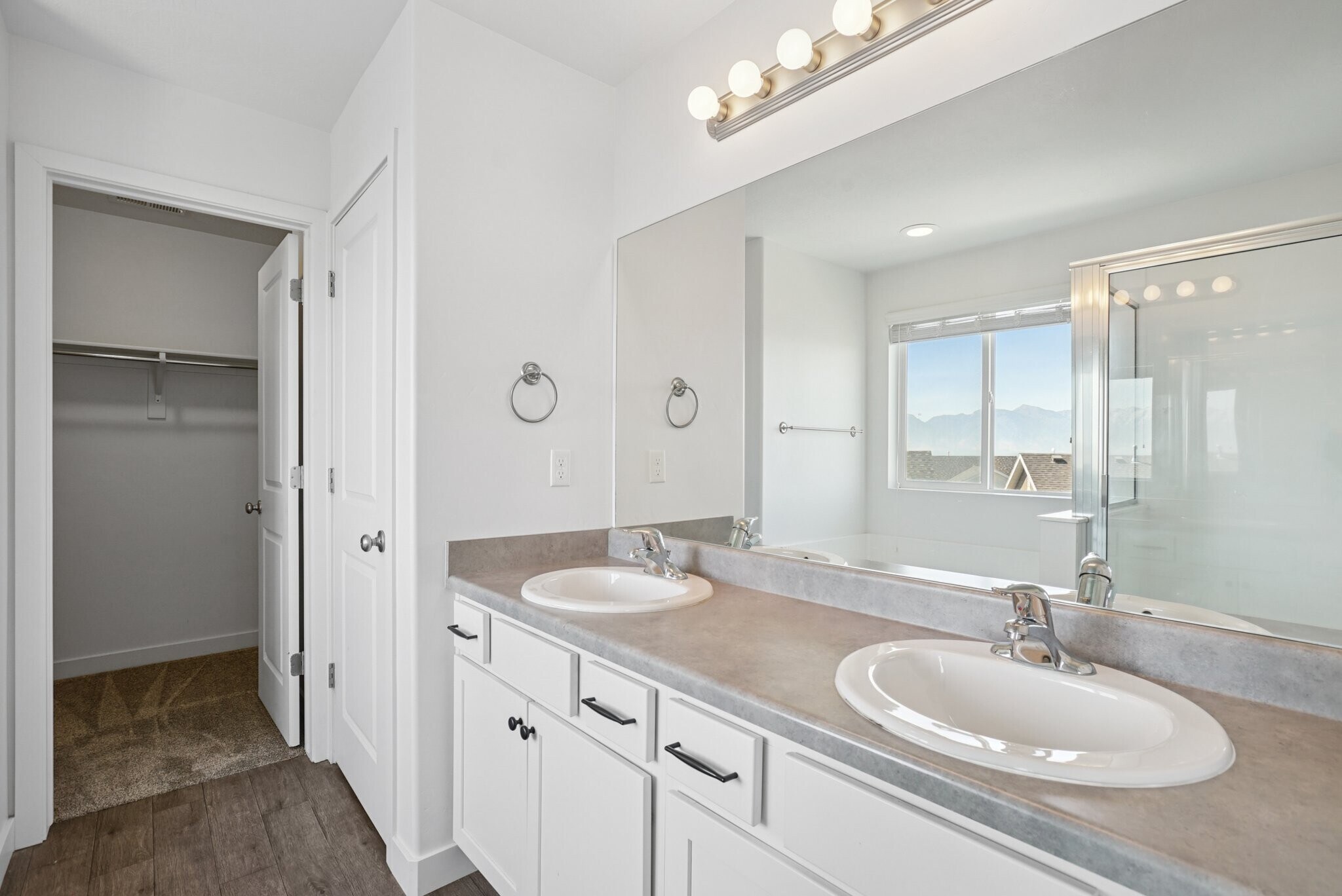 Dual Vanity sinks and toilet closet - 3013 South Red Pine Drive