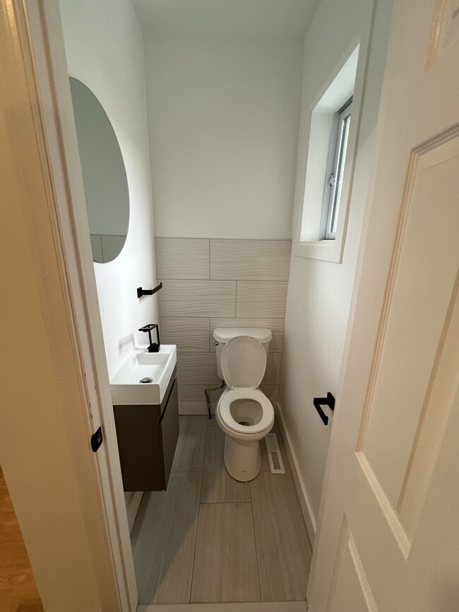 Half Bathroom on the first floor. - 3025 N 21st St