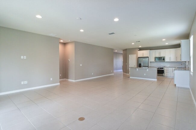 Building Photo - Gorgeous Energy Efficient 4/2 Home in Gated Community Close to Lake Nona