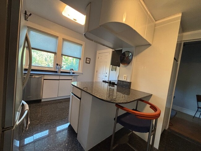 Building Photo - Vintage Beauty, Modern Living – Historic Condo Awaits!