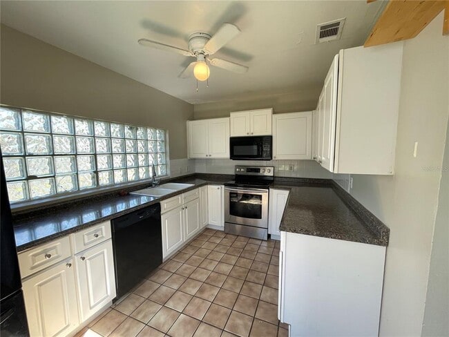 Building Photo - 10204 N Edison Ave